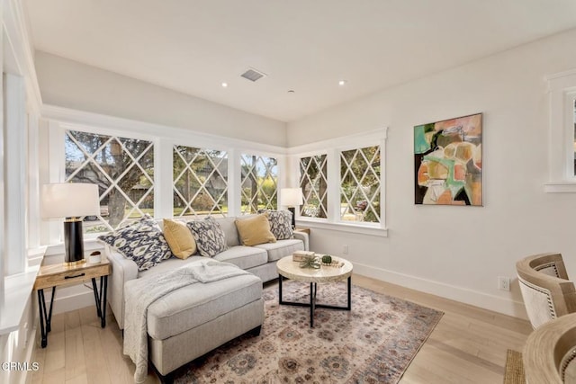 living room featuring light wood-type flooring