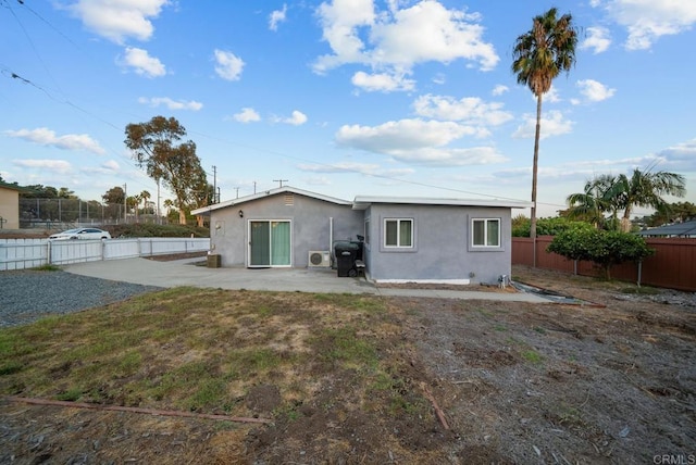 rear view of house with a patio area