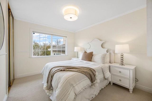 bedroom featuring ornamental molding and light carpet