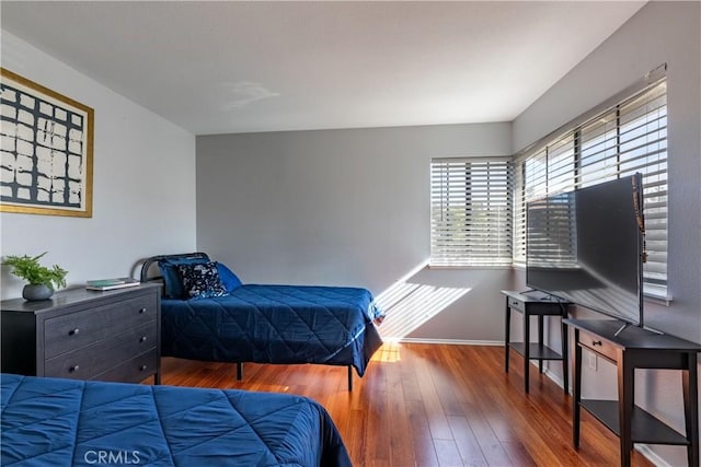 bedroom featuring dark hardwood / wood-style floors