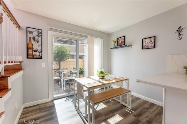 dining room featuring dark hardwood / wood-style flooring