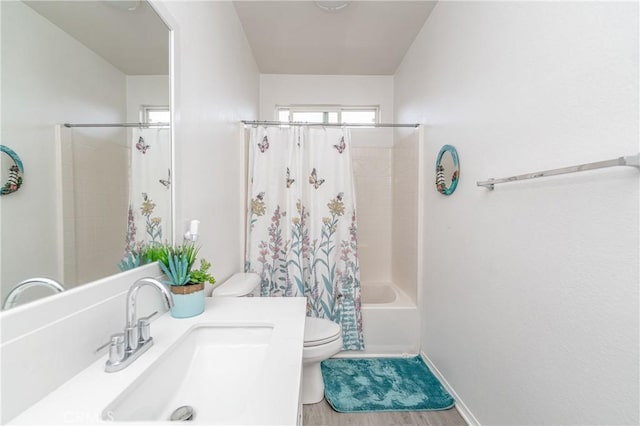 full bathroom with toilet, wood-type flooring, shower / bathtub combination with curtain, and vanity