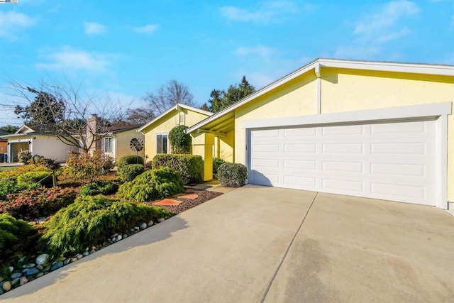 ranch-style house featuring a garage