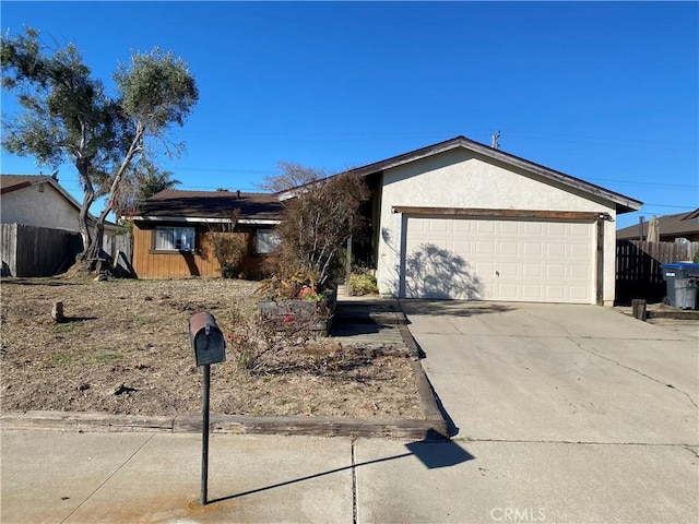 single story home with a garage