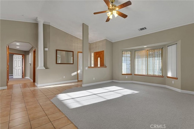 empty room with light colored carpet, ornamental molding, decorative columns, and ceiling fan