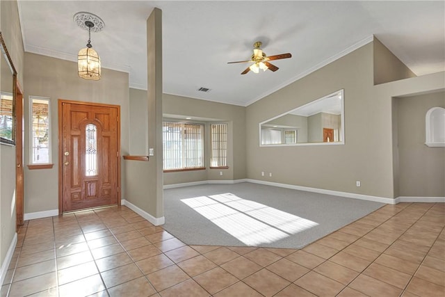 foyer featuring crown molding, ceiling fan with notable chandelier, and light colored carpet