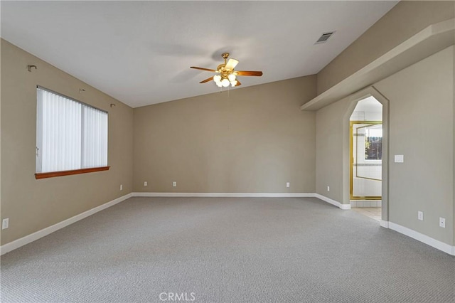 carpeted empty room with ceiling fan