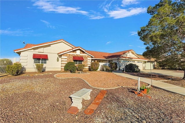 ranch-style home with a garage