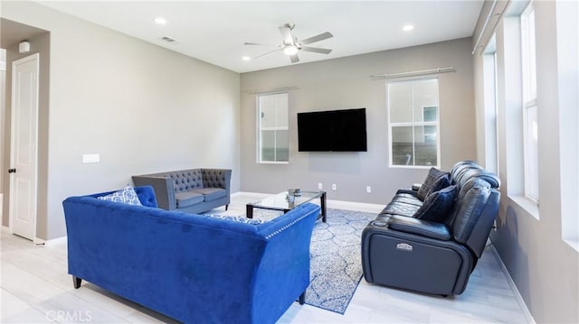 living room with ceiling fan