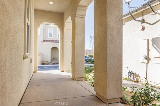 doorway to property with a patio area