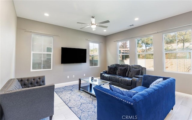 living room with ceiling fan