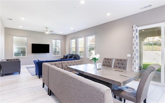 dining space featuring ceiling fan