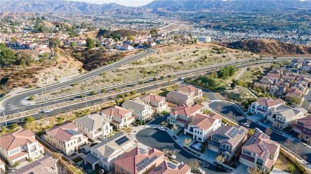 drone / aerial view featuring a mountain view