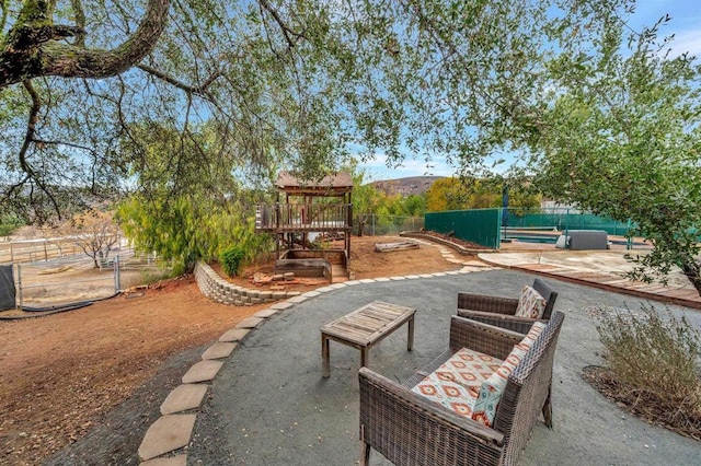 view of patio / terrace featuring outdoor lounge area and a mountain view