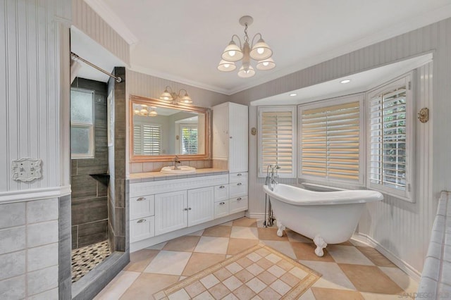 bathroom featuring vanity, ornamental molding, a chandelier, and separate shower and tub