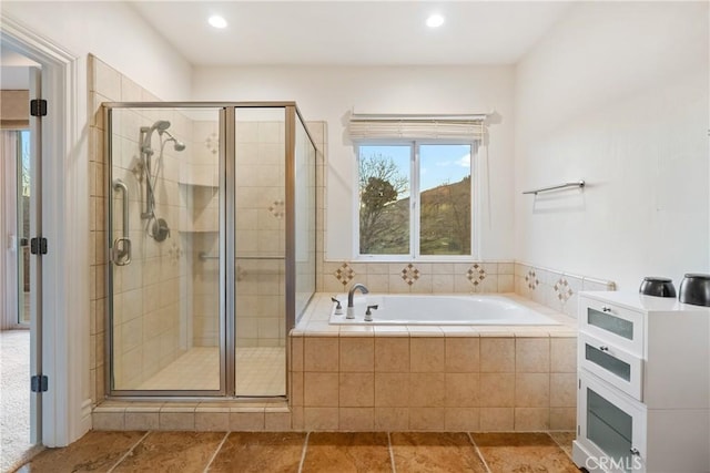 bathroom with independent shower and bath