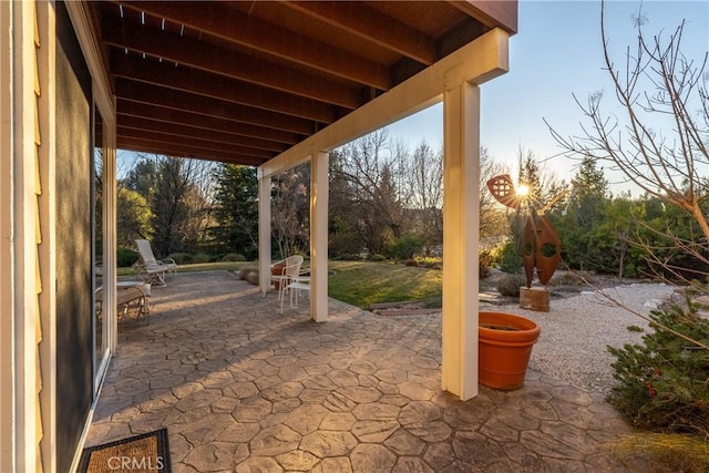 view of patio terrace at dusk