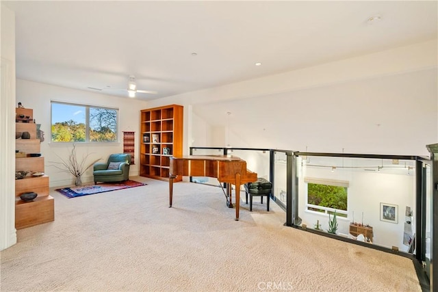 miscellaneous room featuring carpet flooring and ceiling fan