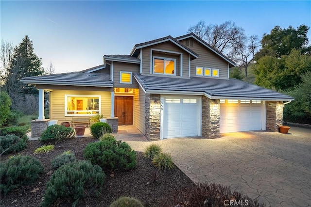 view of front of property featuring a garage