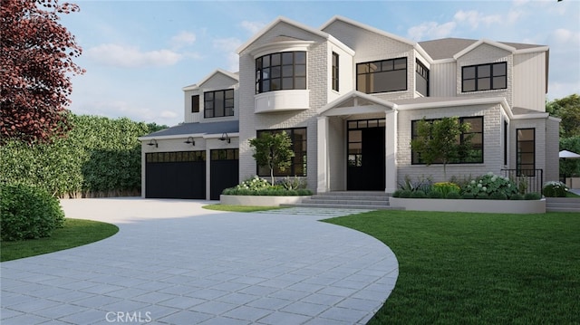 view of front of home featuring a garage and a front lawn