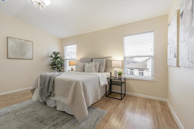 bedroom with light hardwood / wood-style flooring