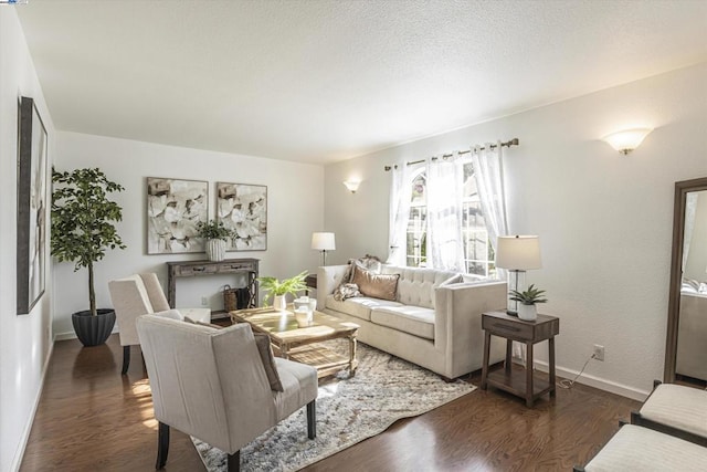 living room with dark hardwood / wood-style flooring