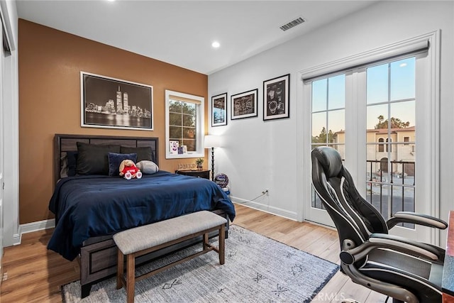 bedroom with wood-type flooring