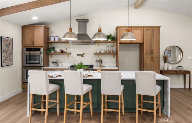 kitchen with exhaust hood, pendant lighting, double oven, and decorative backsplash