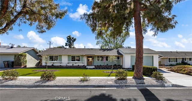 ranch-style home with a garage and a front yard