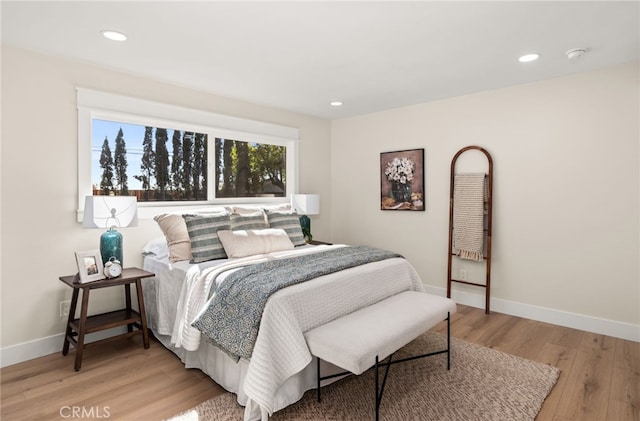 bedroom featuring light wood-type flooring