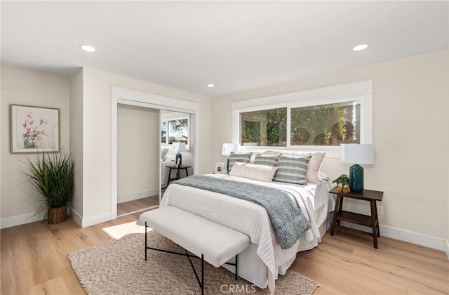 bedroom featuring light wood-type flooring