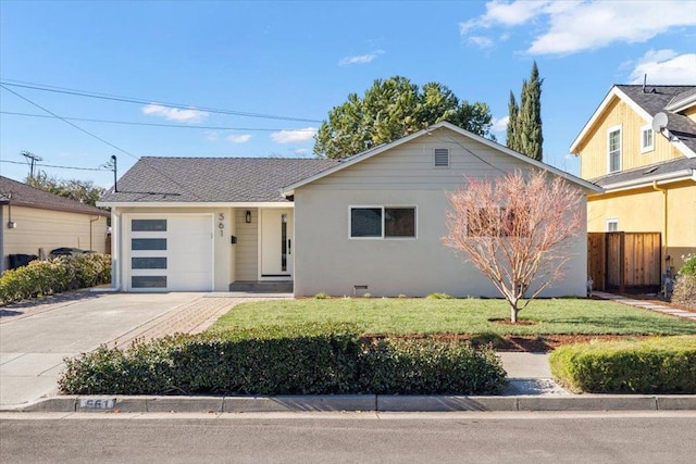 single story home featuring a garage and a front lawn