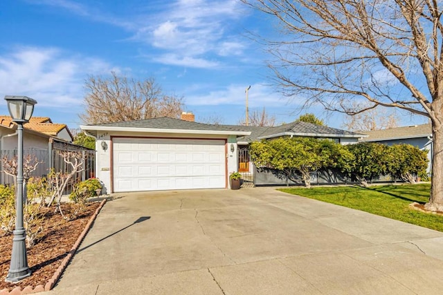 single story home with a garage and a front yard