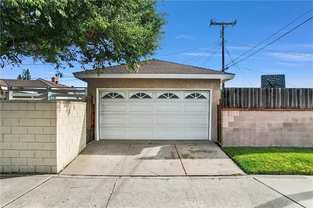 detached garage with fence