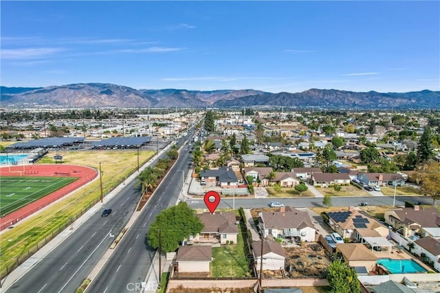 bird's eye view featuring a residential view and a mountain view