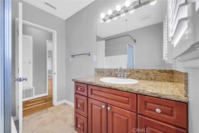 bathroom featuring vanity and tile patterned floors