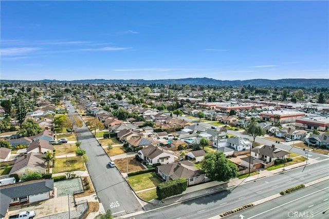 birds eye view of property featuring a mountain view