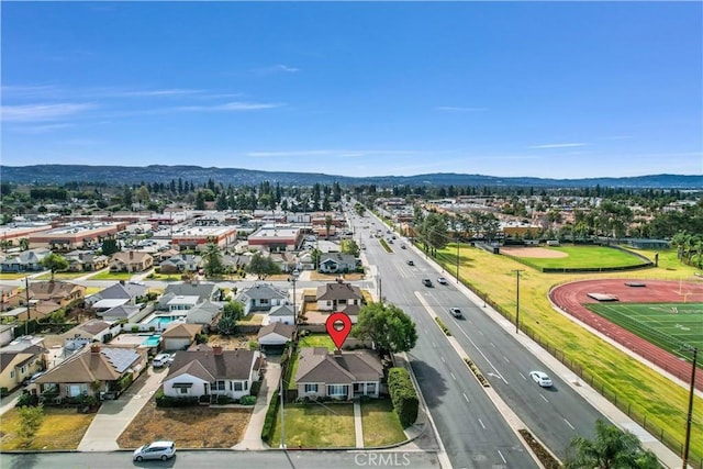 bird's eye view featuring a residential view and a mountain view