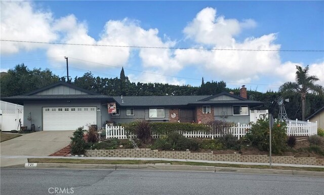 single story home featuring a garage