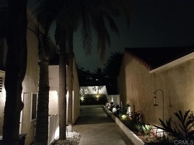 view of property exterior at twilight