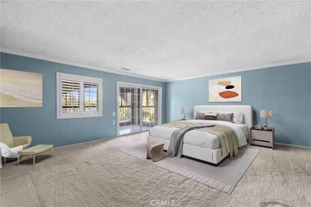 bedroom with a textured ceiling, carpet flooring, visible vents, access to outside, and crown molding