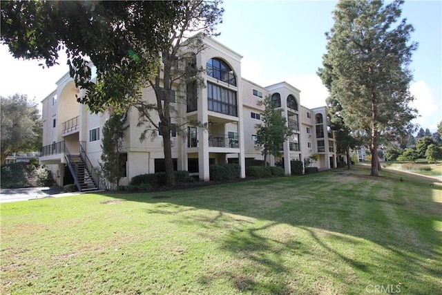 view of property featuring stairs