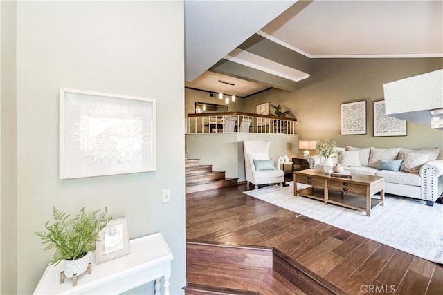 living room featuring crown molding, lofted ceiling, and wood-type flooring