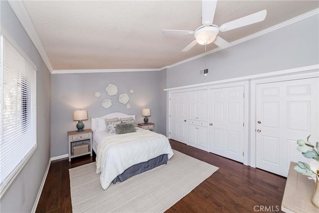 bedroom featuring ceiling fan, ornamental molding, and dark hardwood / wood-style floors