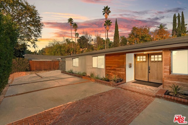 view of front of home featuring a patio