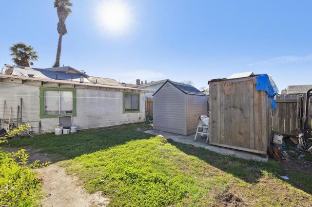 exterior space with a shed