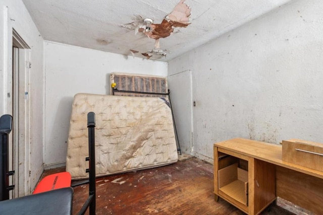 unfurnished bedroom featuring dark hardwood / wood-style flooring