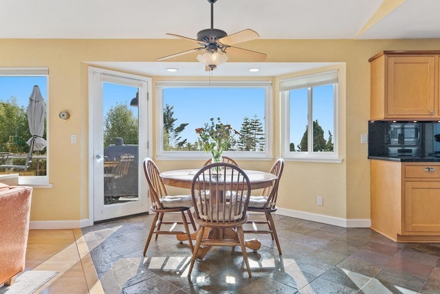 dining area featuring ceiling fan