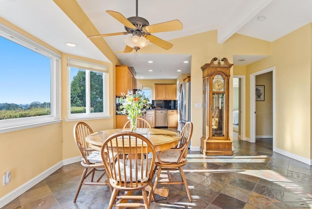 dining space with lofted ceiling with beams and ceiling fan