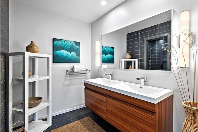 bathroom featuring vanity and a shower